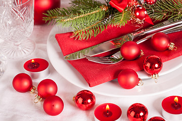 Image showing Red themed Christmas place setting