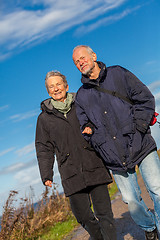 Image showing happy mature couple relaxing baltic sea dunes 