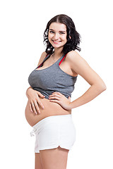 Image showing Happy beautiful young pregnant woman