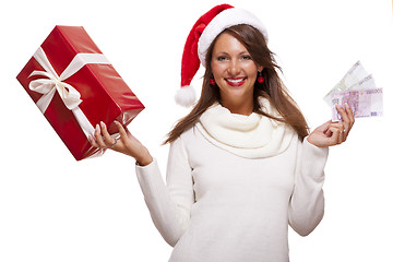 Image showing Young woman with an Xmas gift and money