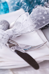 Image showing Stylish blue and silver Christmas table setting