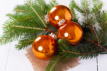 Image showing Shiny bright copper colored Christmas balls