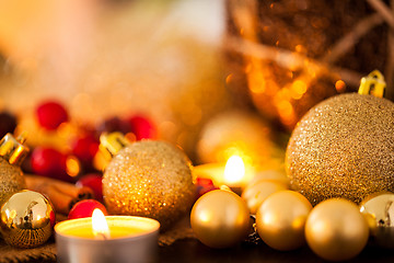 Image showing Warm gold and red Christmas candlelight background