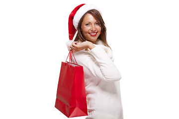 Image showing Happy vivacious Christmas shopper