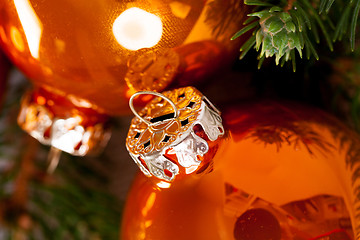 Image showing Shiny bright copper colored Christmas balls