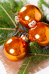 Image showing Shiny bright copper colored Christmas balls