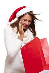 Image showing Happy vivacious Christmas shopper