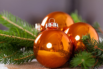 Image showing Shiny bright copper colored Christmas balls