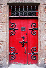 Image showing Red medieval door