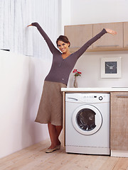 Image showing woman near washing machine l