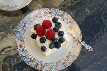 Image showing Piece of gateau with raspberry and blueberry