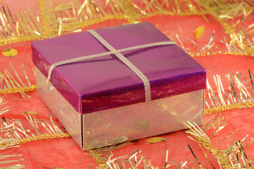 Image showing red gift box with white ribbon bow