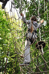 Image showing girl  in a climbing adventure activity park