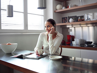 Image showing middle woman in modern kitchen