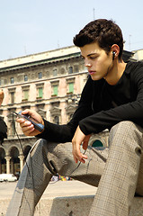 Image showing guy listening to mp3 player 