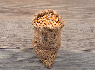Image showing Cereal bag on wood