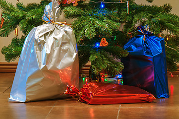 Image showing Christmas presents under the tree