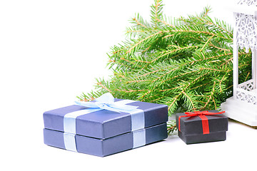 Image showing Christmas gifts, green spruce and lantern