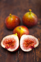 Image showing fresh figs over old wood