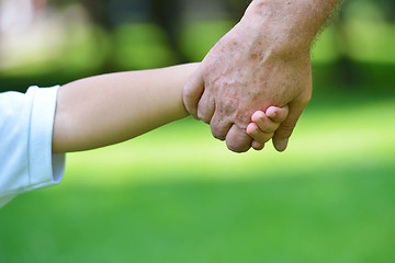 Image showing happy grandfather and child in park