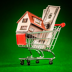 Image showing shopping cart and house