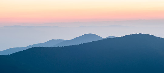 Image showing Panorama  of mountain ridges silhouettes