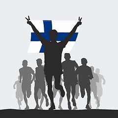 Image showing Winner with the  Finland flag at the finish