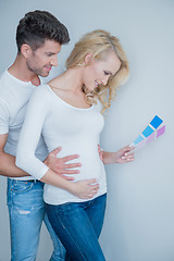 Image showing Sweet Couple Looking at Color Indicator Paper