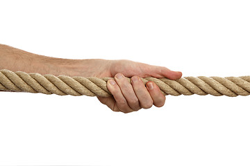 Image showing Man pulls a rope