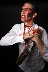 Image showing Psychopath with bloody knive