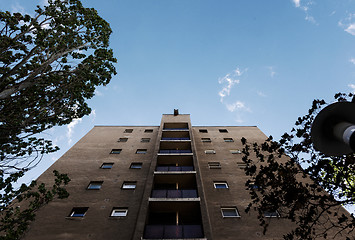 Image showing Dark abandoned building with sky