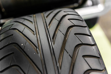 Image showing New car tyre closeup photo