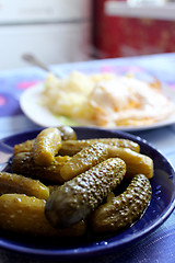 Image showing Cucumbers marinaded and mashed potatoes