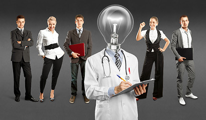 Image showing Business Team With Lamp Head Doctor