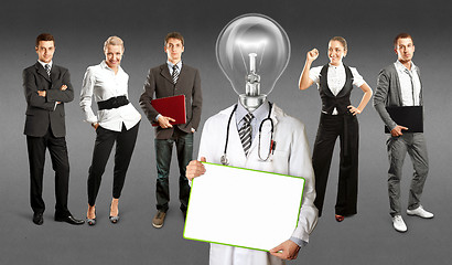 Image showing Business Team With Lamp Head Doctor