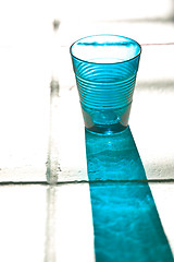 Image showing blue empty glass with reflection