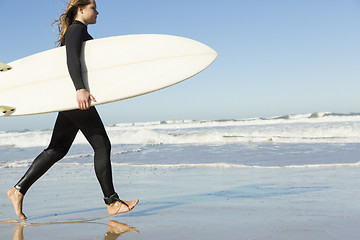 Image showing Surfer girl