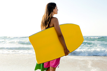 Image showing Girl with her bodyboard