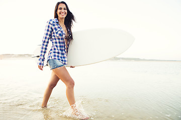 Image showing Beautiful surfer girl