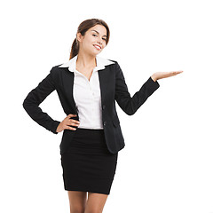 Image showing Business woman showing something