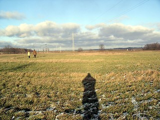 Image showing two people and shadow