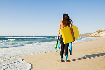 Image showing Girl with her bodyboard