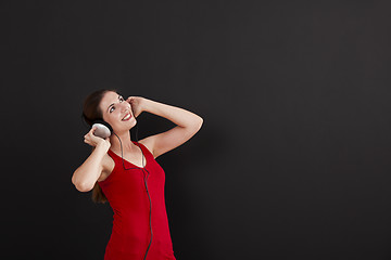 Image showing Woman listen music