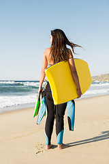 Image showing Girl with her bodyboard