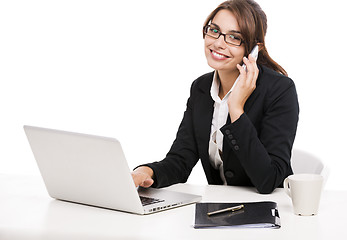 Image showing Businesswoman answering phone