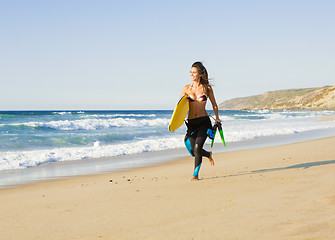 Image showing Girl with her bodyboard