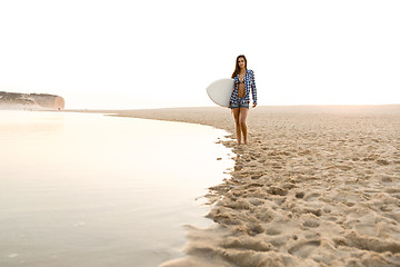 Image showing Beautiful surfer girl