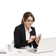 Image showing Businesswoman answering phone