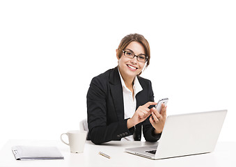 Image showing Businesswoman answering phone