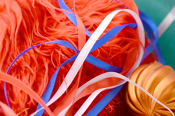 Image showing Red background with white and blue ribbon